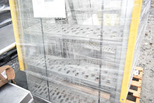 Equipto Ladder, brand new, scratch and dent condition, wrapped in plastic, on wooden pallet, yellow edges.