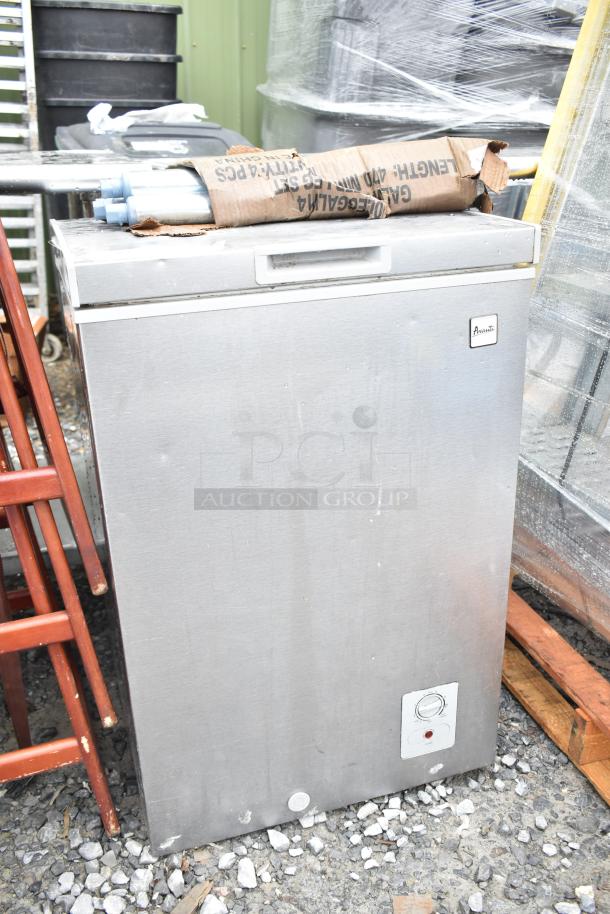 Stainless steel chest freezer, 115 volts, 1 phase, front temperature control, Amana logo. Used condition.