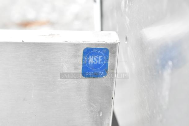 Commercial 3 Bay Back Bar Sink featuring an ice bin and speedwell. Visible NSF certification label "D024072" ensures compliance.