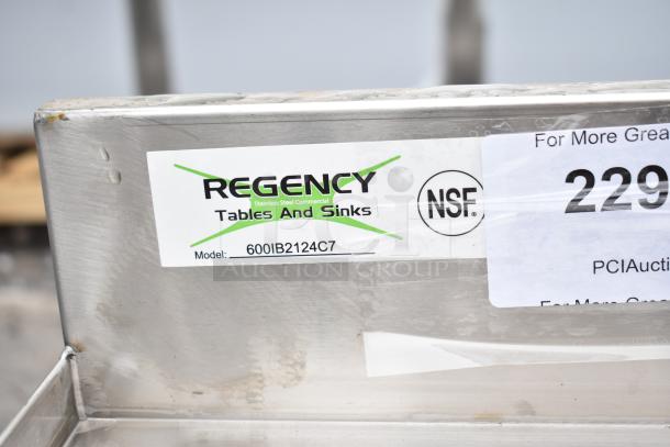 Regency 600IB2124C7 21"x24" ice bin with cold plate, bottle holders; shows model and NSF label; stainless steel.