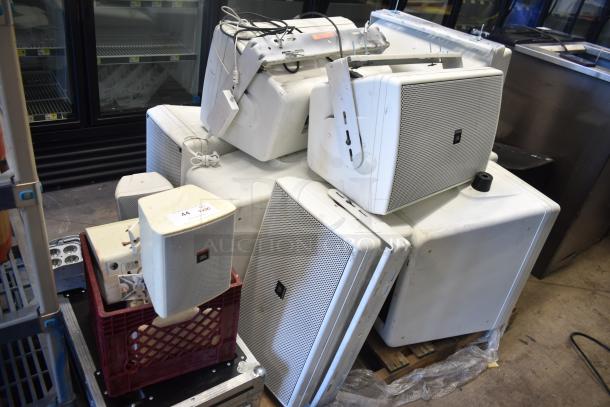 Audio equipment lot including JBL Control 30 and 25AV speakers, light, and Rockville wireless lights in hard case. 