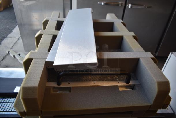 BRAND NEW De Shaw 12-00123-01-MOD_A00 unit, in original packaging, slight cosmetic scratches, securely packed for transit.