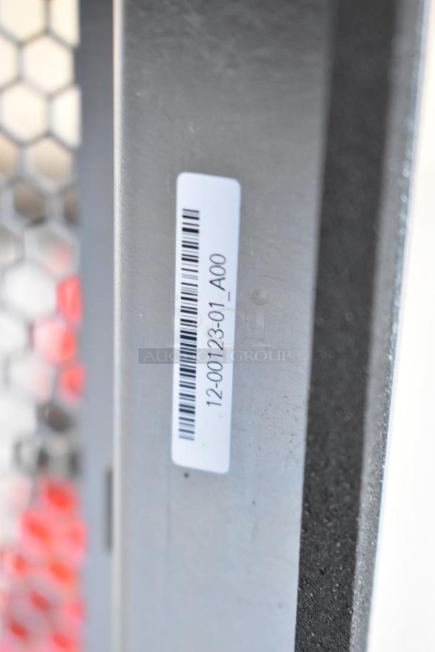 BRAND NEW SCRATCH AND DENT! De Shaw 12-00123-01-MOD_A00 unit with visible barcode label. Slight cosmetic marks.