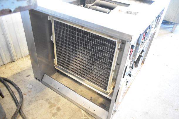 2021 Ice-O-Matic ICE1506HT2 commercial ice head, 208-230V, 1 phase, stainless steel, components visible, good condition.