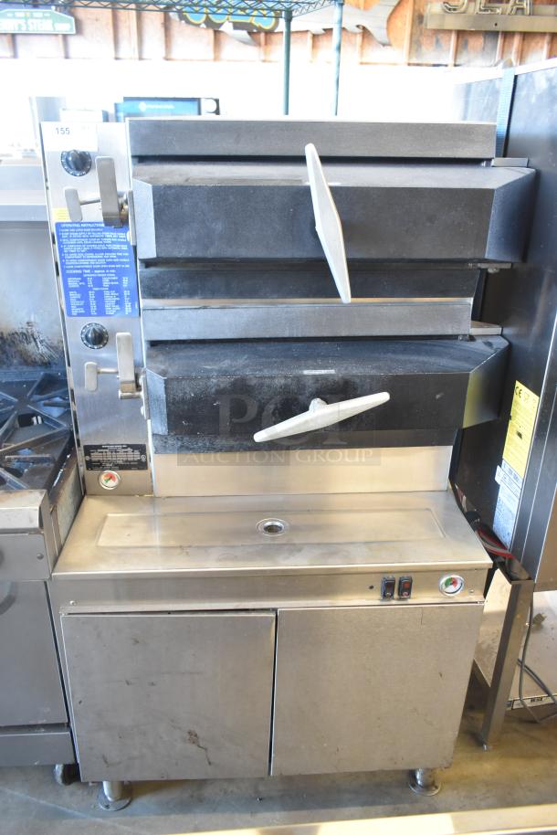 Cleveland Commercial 2 Deck Pressure Steam Cabinet, stainless steel, with control dials and instruction labels, good condition.