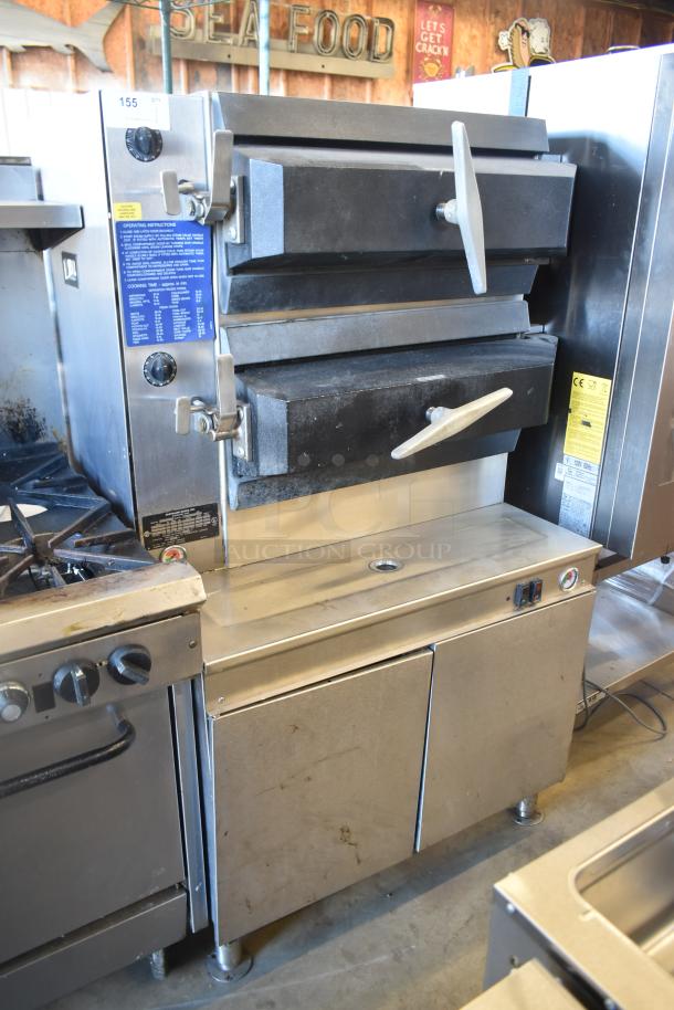 Cleveland Commercial 2 Deck Pressure Steam Cabinet with control dials, stainless steel finish, visible instructions, used condition.