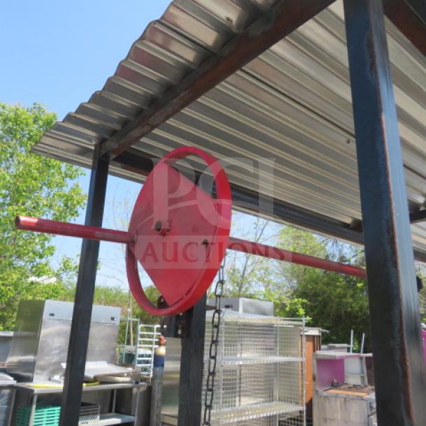 UNIQUE outdoor BBQ/frying appliance with grill, dual deep fryer, covered roof, on casters, 109x34x83, in used condition.