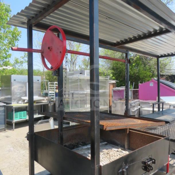 Unique outdoor BBQ/Frying appliance with grill and dual deep fryer, metal roof, on casters, dimensions 109x34x83.