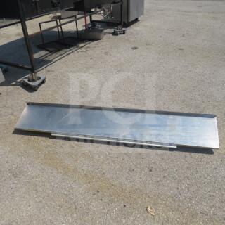 Stainless steel wall mount shelf, 72x12x10 inches, includes 1 bracket and 44-inch ticket rail attached, shown outdoors.