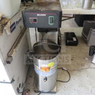 Bunn Tea Brewer with Satellite, model 10X23X35, in used condition. Features stainless steel construction and control panel.
