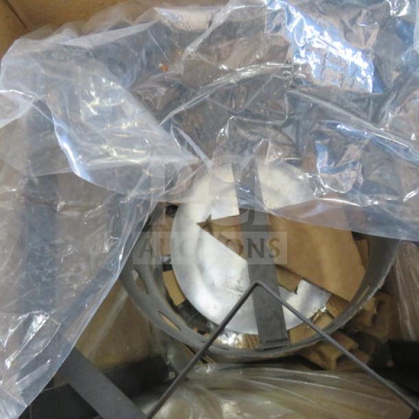 Expert Grill 30qt Turkey Fryer, unpackaged condition, includes components like burner and stand, partially visible under plastic wrap.