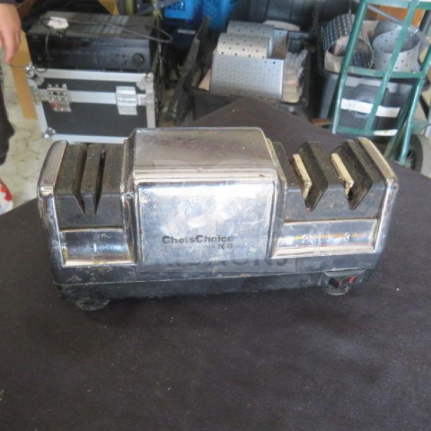 Chef Choice Diamond Sharpener Model 100, used condition, visible wear on surface, dual-slot design, plug-in model.