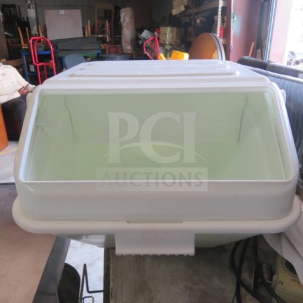 White plastic ingredient bin without lid, open-top design, used condition. Ideal for kitchen storage or bulk materials.