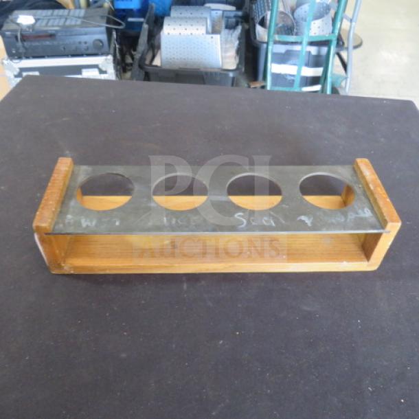 Wooden Metal 4-Hole Shot Flight, used condition, wooden base, metal top with four circular cutouts, chalk markings visible.