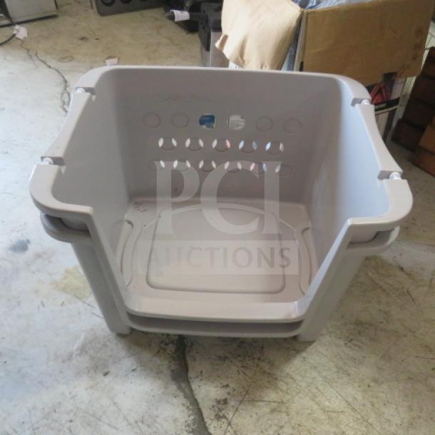 Gray poly bin with perforated sides, model 2XBID. Used condition with visible wear. Ideal for storage.