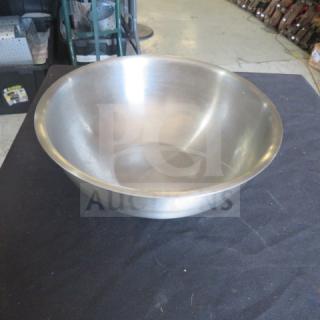 Stainless steel 5qt bowl, gently used, smooth finish, wide rim, suitable for mixing or serving.