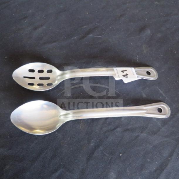 Two stainless steel spoons; one slotted, one solid. Tag marked "41." Smooth finish, auction item "Assorted Stainless Steel Spoon."