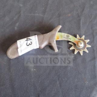 Vintage pastry cutter with a wooden handle and metal rotary wheel. Moderate wear. Auction tag reads "43".