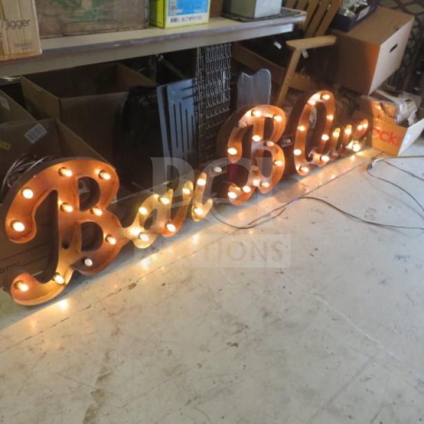 Vintage-style tin BBQ lighted sign, 84x17 inches, with warm bulbs, spelling "Bar-B-Que." Ideal for decor or events.