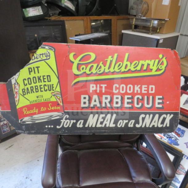 Vintage Castleberry's Pit Cooked Barbecue sign, 41x20 inches, red and black, showing wear, ideal for collectors.