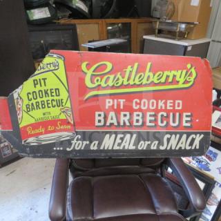 Vintage Castleberry's Pit Cooked Barbecue sign, 41x20 inches, red and black, showing wear, ideal for collectors.