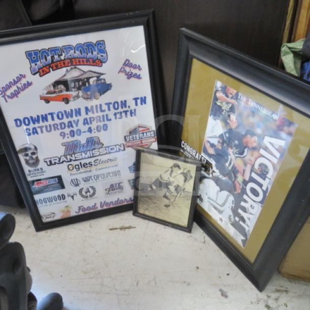 Framed assorted pictures, includes 'Hot Rods in the Hills' poster, sports victory photo, and vintage hockey image.