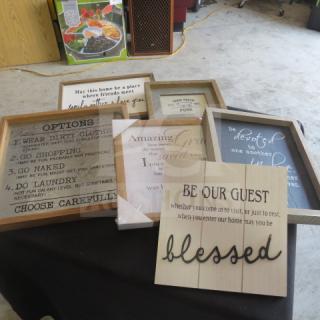 Assorted decor signs with engraved and printed motivational quotes, various wood frames, good condition.