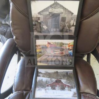 Three framed vintage-style decor photos on a chair, including vintage signs and a rustic barn, in good condition.