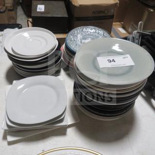 Assorted salad plates in multiple styles and colors stacked in a lot, includes circular and square designs, labeled as "One Mega Lot."