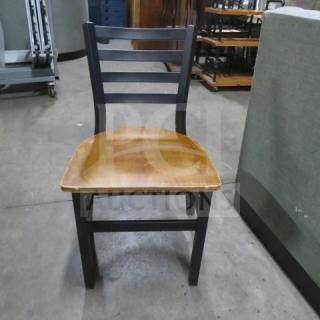 Black metal chair with wooden seat, 2XBID model. Minimalist design, sturdy construction, good condition.