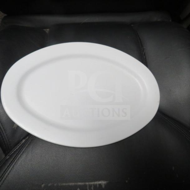 Prolon Melamine Platter, 13x9 inches, oval shape, white, in good condition.