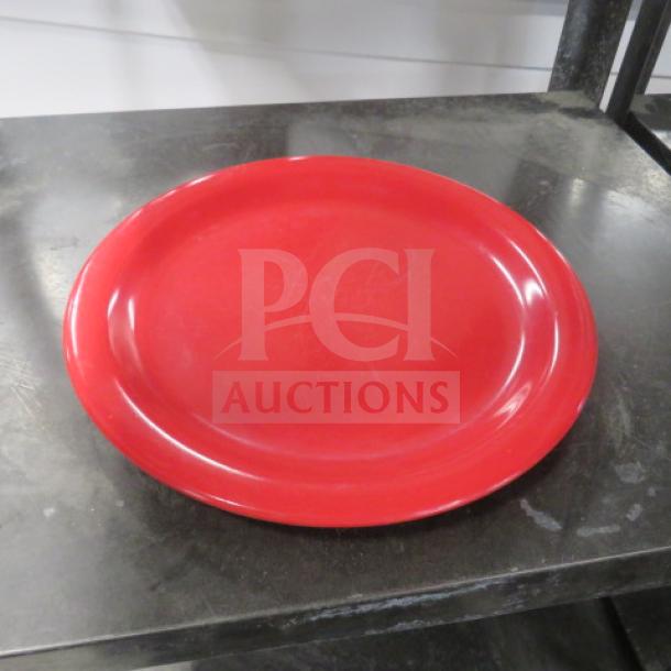 Red Carlisle 9-inch melamine plate, smooth surface, good condition, model 12XBID, durable and stylish for dining.
