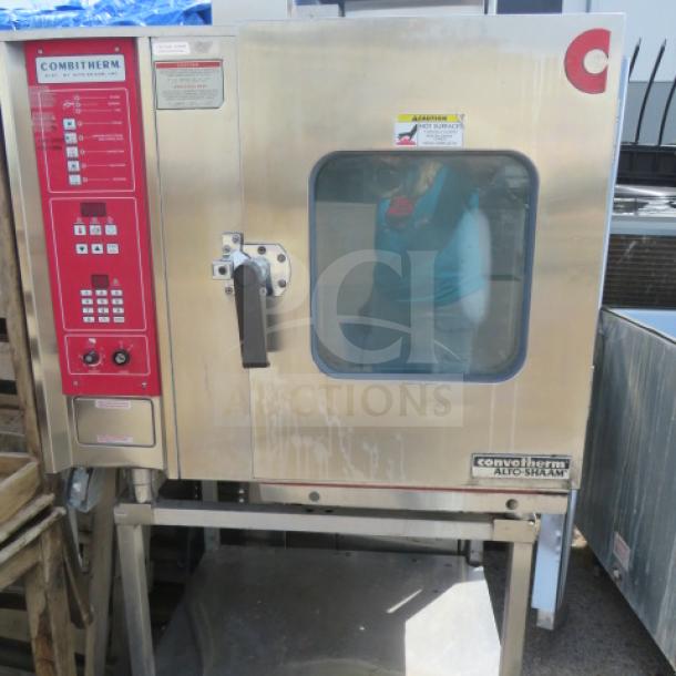 Alto Sham Combitherm Combi Oven, Model 6.10, on stainless steel stand with under shelf, 38x29x68 inches, on casters.