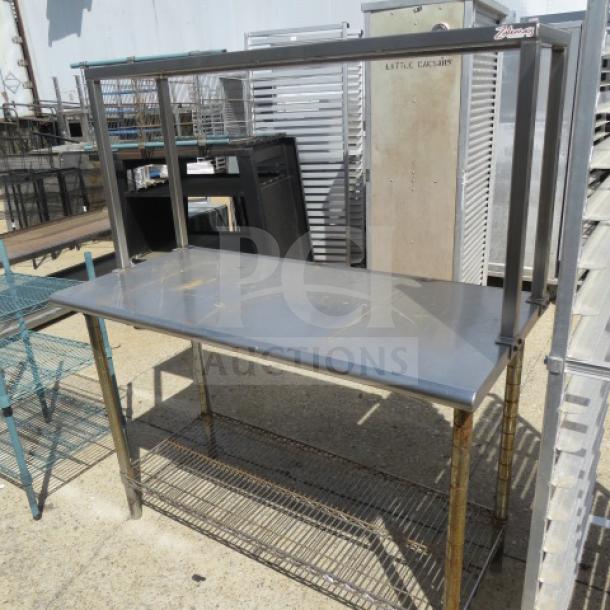 Stainless steel table with SS overshelf, Metro undershelf, dimensions 50x23x60, in good condition.