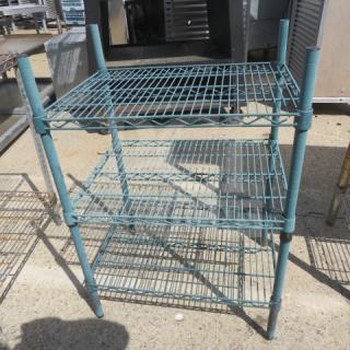 One green Metro shelf unit with three wire shelves, measuring 24x18x36 inches. Good condition.