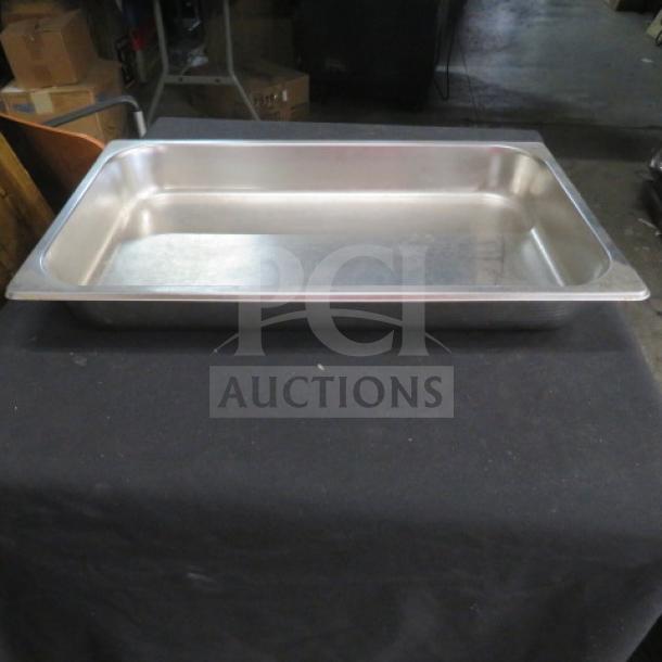 Full-size 2.5-inch deep stainless steel hotel pan in good condition. Suitable for commercial kitchen use.