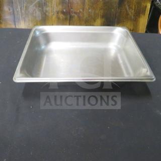 Stainless steel half size hotel pan, 4-inch deep, gently used, suitable for catering or restaurant use.