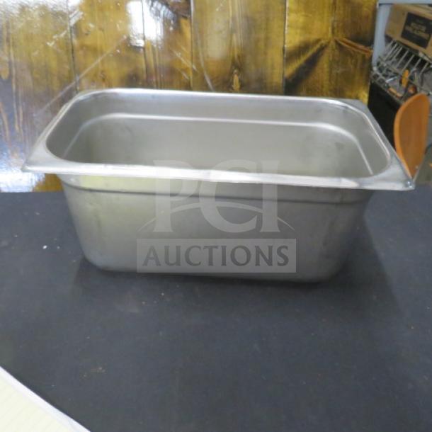 1/3 Size Hotel Pan, 6-inch deep, stainless steel. Lightly used, in good condition. Item code: 2XBID.