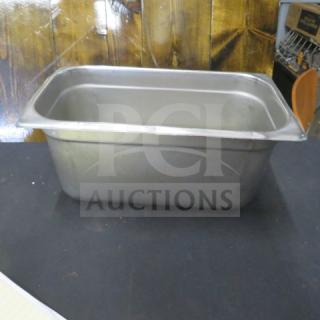 1/3 size, 6-inch deep hotel pan, stainless steel, used condition. Ideal for food service or kitchen use.