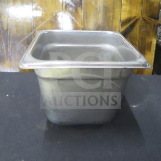 1/6 size, 6-inch deep hotel pan in stainless steel, used condition. Ideal for commercial kitchen use, model 2XBID.