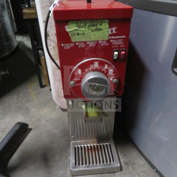 Grindmaster commercial coffee grinder model 835, red, 115V, used condition, price tag $1167.90, note reads "364 lbs of coffee."