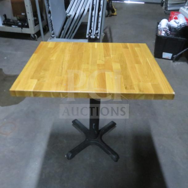 Butcher block table on pedestal base, 24x30x30 inches, wood top, metal base, excellent condition.