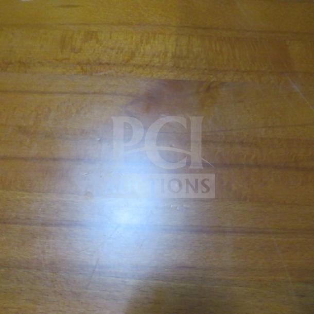 Butcher block table with pedestal base, 24x30x30 inches, light wood grain, smooth finish, excellent condition.