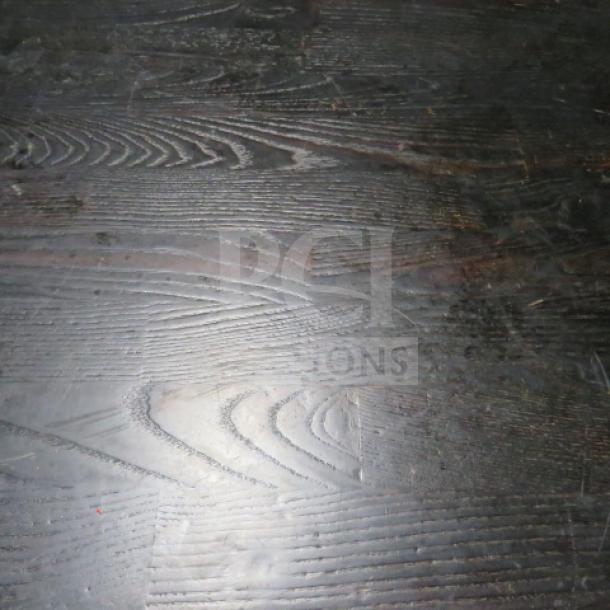 Butcher block table surface with visible wood grain, pedestal base, dimensions 24x24x30 inches, used condition.