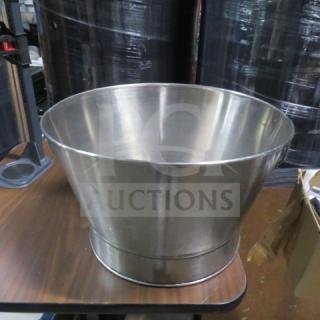 Stainless steel beverage holder, 20x13 inches, conical shape, polished finish, excellent condition.