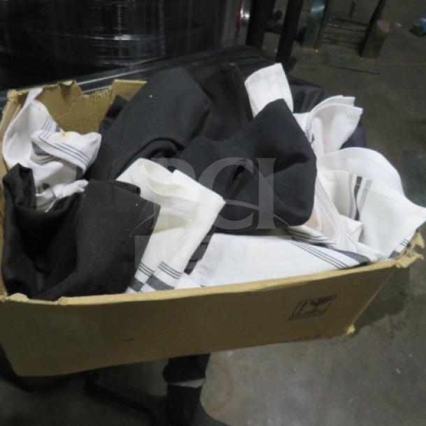 Box of assorted napkins, black and white, various patterns, gently used condition.