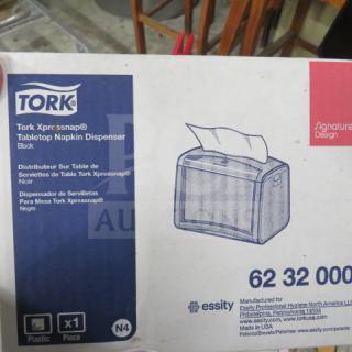 NEW Tork Xpressnap Napkin Dispenser in box. Model 62 32 000, black, tabletop design. Includes 1 piece. Made in USA.