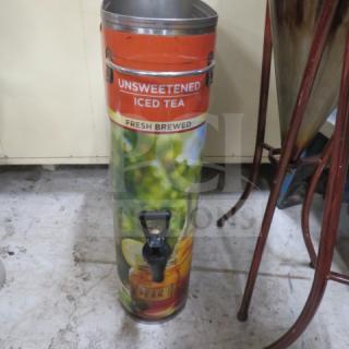 Tall stainless steel Slim Jim tea dispenser for unsweetened iced tea, featuring vibrant graphics and a pour spout.
