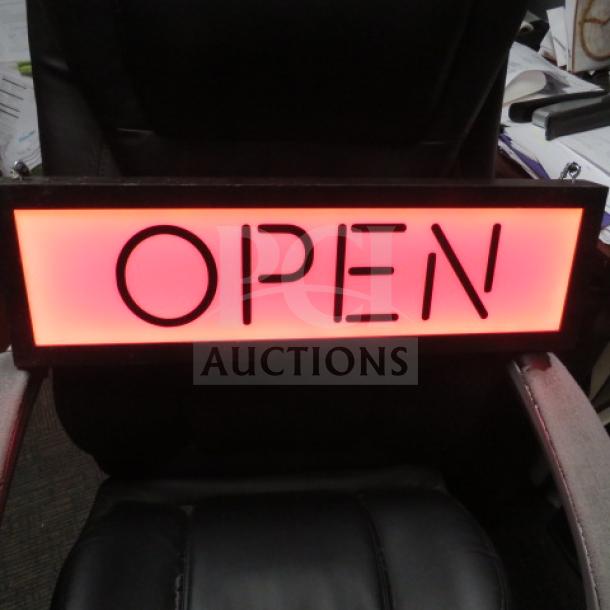 A red illuminated "OPEN" sign, 23x7 inches, operational but missing a plug.