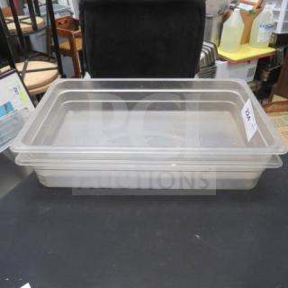 Full size 4-inch deep clear food storage container, stackable, good condition, 2XBID tag visible.